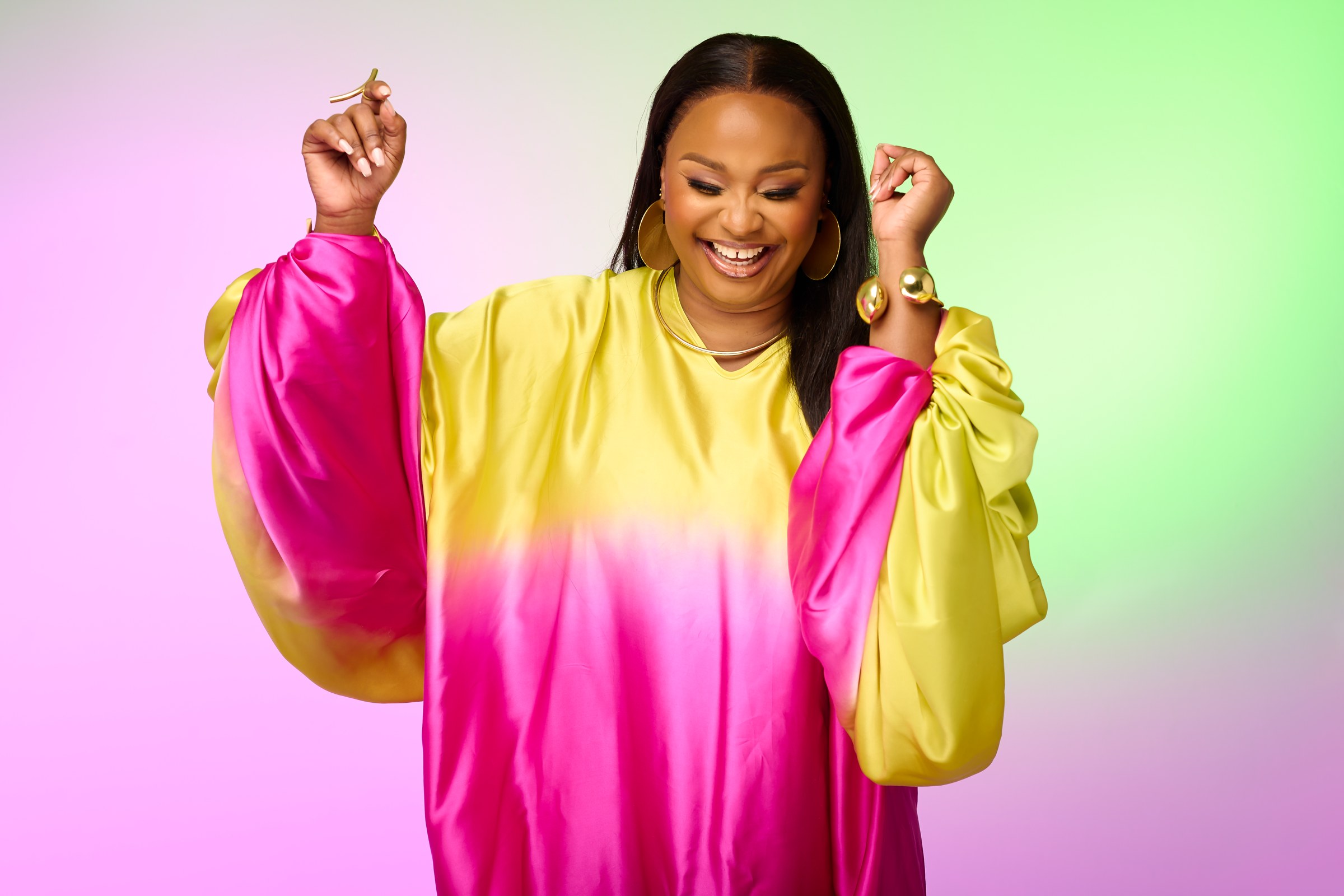 Xolly in vibrant yellow and pink styling